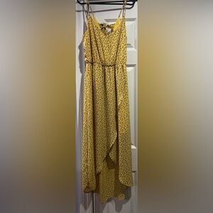 flowy yellow dress with flowers on it